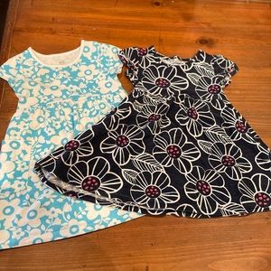 Two toddler play dresses
